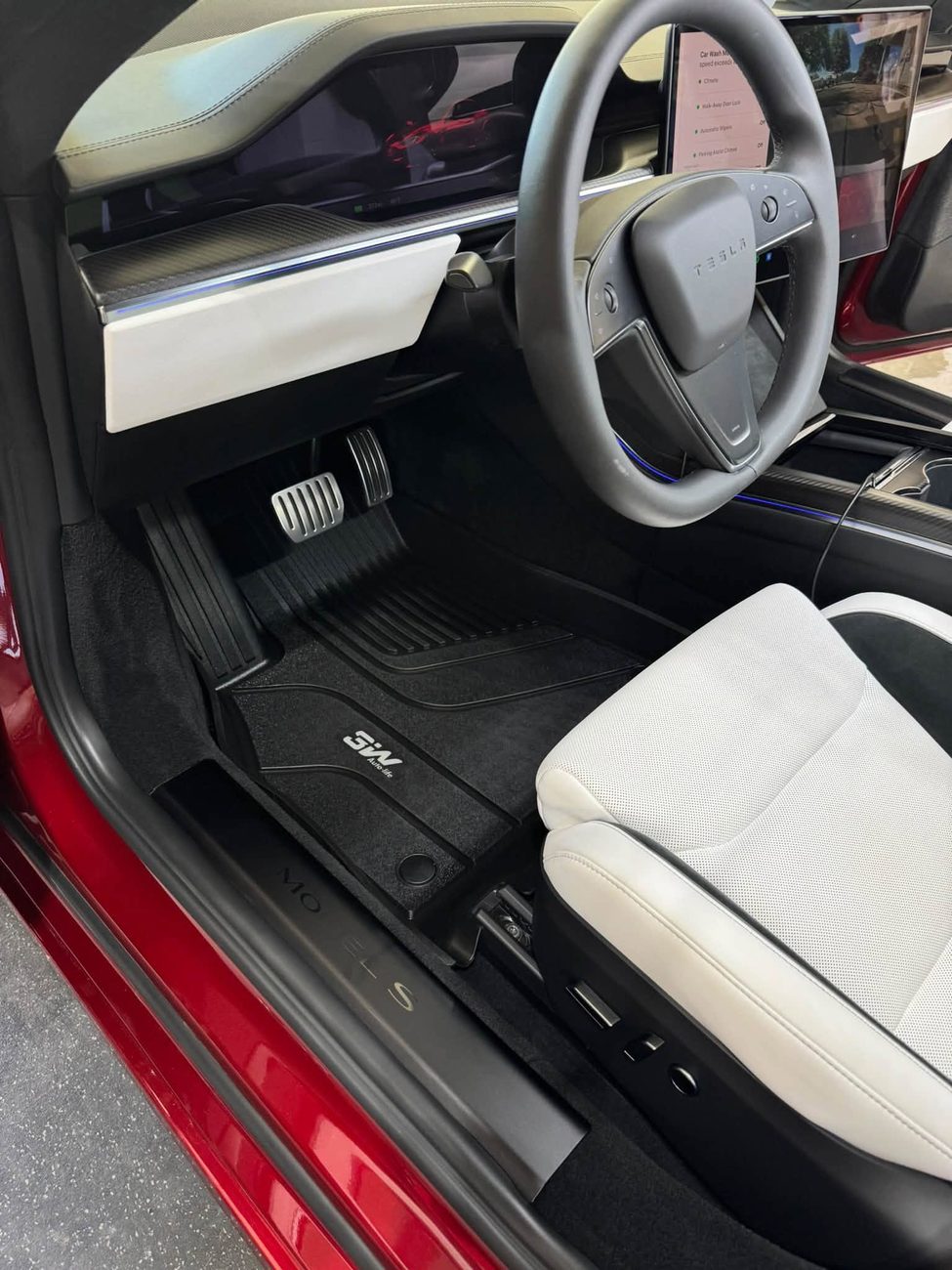 A white Tesla interior cleaned front to back