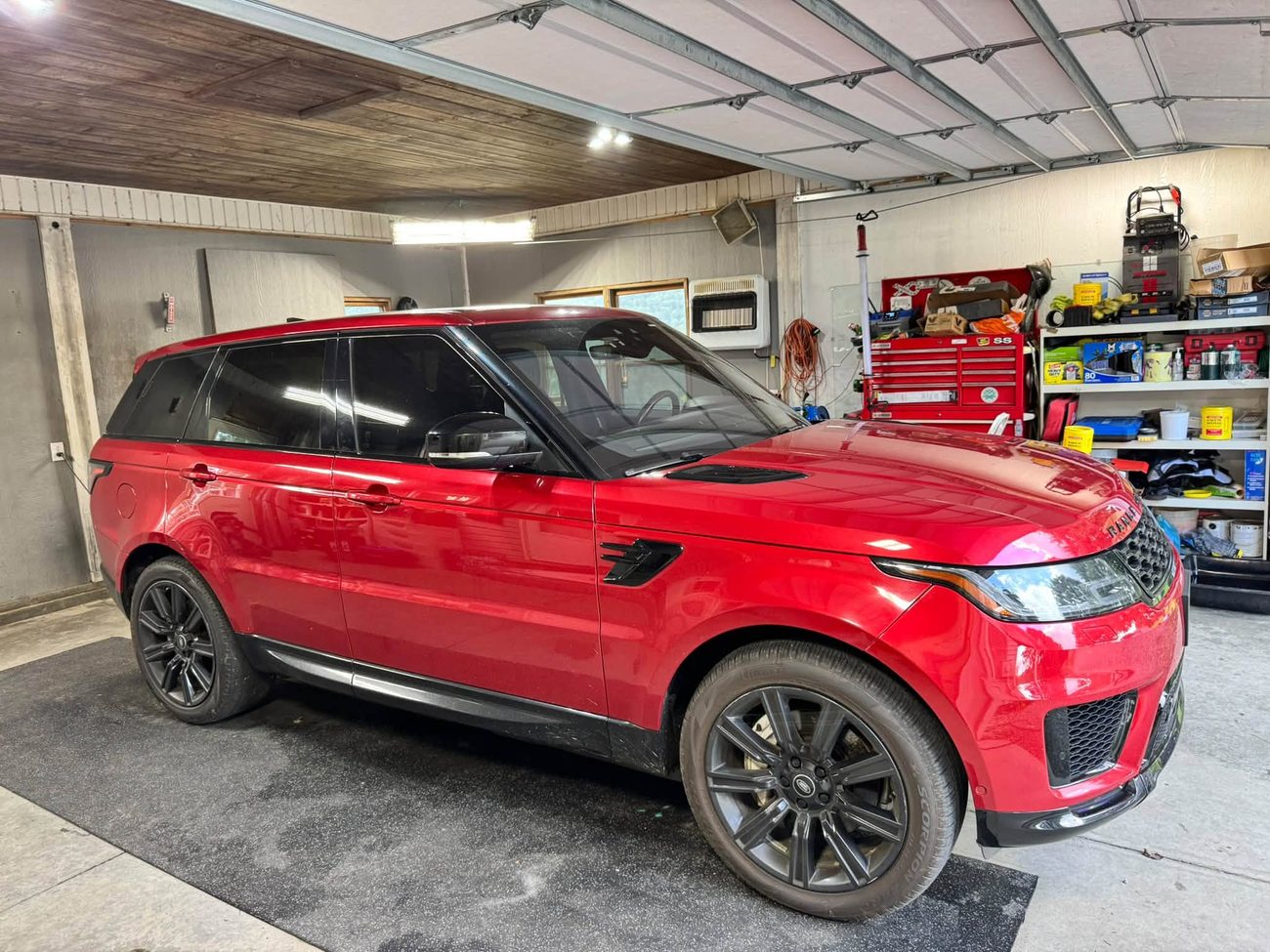 A red Range Rover Sport after a full detail